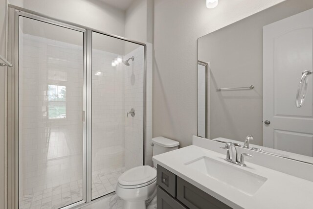 27423 Parker Spring Ct, Katy, TX 77494 - full bathroom featuring toilet, a stall shower, vanity, and marble finish flooring
