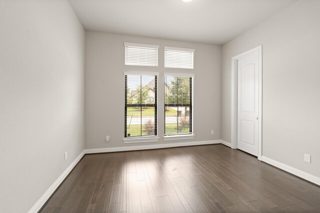 27423 Parker Spring Ct, Katy, TX 77494 - spare room with dark wood-type flooring and baseboards