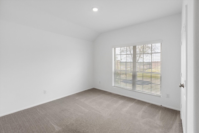 21219 Mangrove Ln, Cypress, TX 77433 - spare room with vaulted ceiling, carpet flooring, baseboards, and recessed lighting
