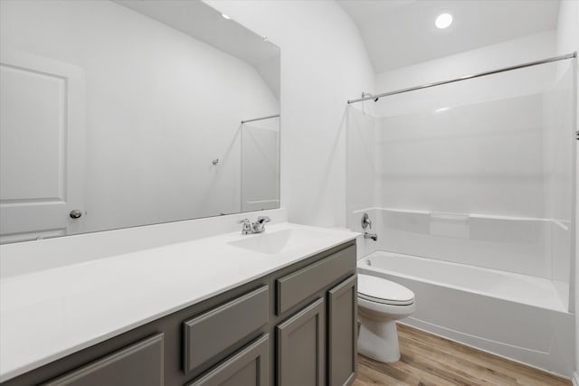 21219 Mangrove Ln, Cypress, TX 77433 - full bath featuring toilet, shower / bath combination, vanity, wood finished floors, and recessed lighting