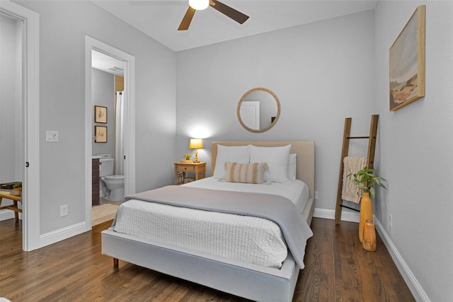 7 Woodglade Way, Tomball, TX 77375 - bedroom featuring wood finished floors, baseboards, connected bathroom, and a ceiling fan