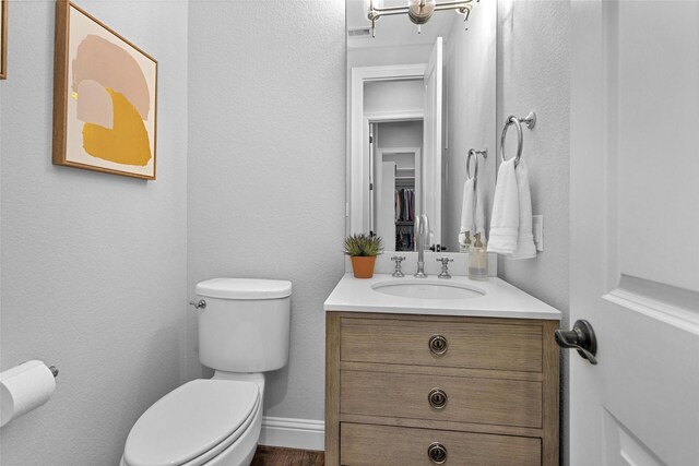 7 Woodglade Way, Tomball, TX 77375 - bathroom with toilet and vanity