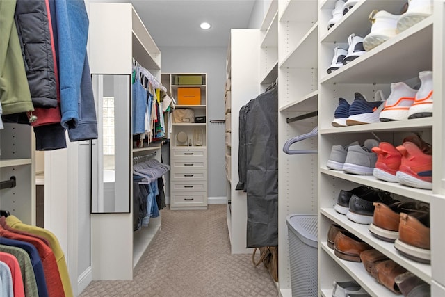 7 Woodglade Way, Tomball, TX 77375 - walk in closet featuring light carpet
