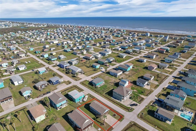 4023 Grayson Dr, Galveston, TX 77554 - aerial perspective of suburban area featuring a nearby body of water and property boundaries highlighted