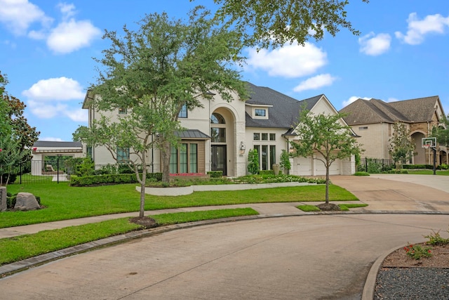 23323 Two Harbors Glen St, Katy, TX 77494 - view of front of house featuring driveway, a residential view, and a garage