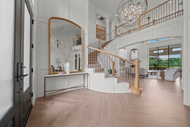 23323 Two Harbors Glen St, Katy, TX 77494 - entryway with a towering ceiling, stairway, and a chandelier