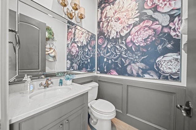 23323 Two Harbors Glen St, Katy, TX 77494 - bathroom featuring vanity, toilet, and a decorative wall