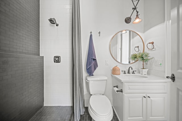 23323 Two Harbors Glen St, Katy, TX 77494 - full bath featuring a tile shower, toilet, and vanity