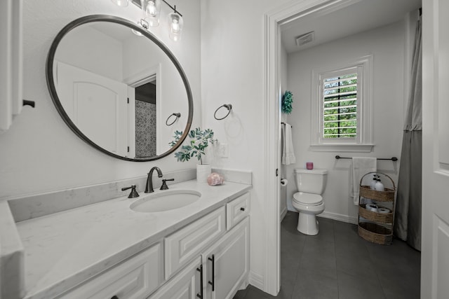 23323 Two Harbors Glen St, Katy, TX 77494 - bathroom featuring vanity, tile patterned floors, toilet, and baseboards