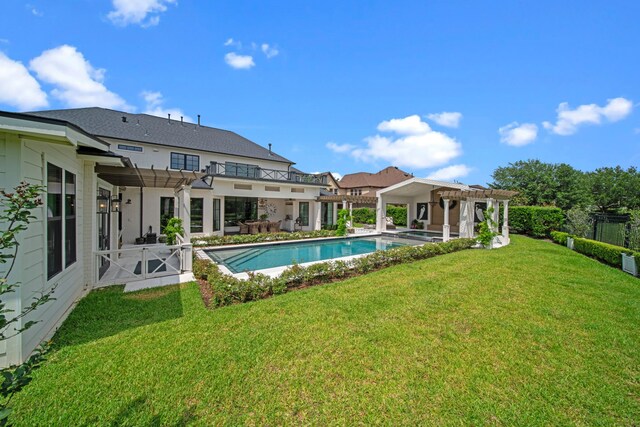23323 Two Harbors Glen St, Katy, TX 77494 - view of pool featuring a pergola, a yard, a patio area, and a pool with connected hot tub