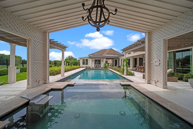 23323 Two Harbors Glen St, Katy, TX 77494 - view of swimming pool with a patio area, a pool with connected hot tub, and a pergola