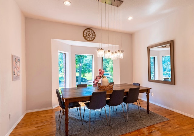 5343 Appleblossom Ln, Friendswood, TX 77546 - dining area featuring light wood-style flooring and recessed lighting