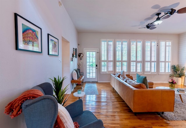 5343 Appleblossom Ln, Friendswood, TX 77546 - living area featuring light wood finished floors and a ceiling fan