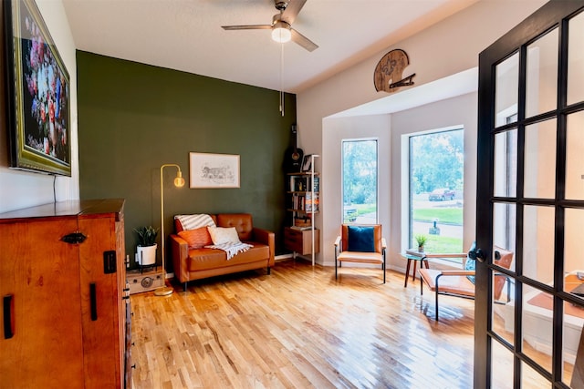5343 Appleblossom Ln, Friendswood, TX 77546 - sitting room featuring ceiling fan and light wood-style floors