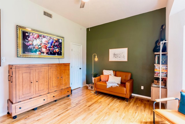 5343 Appleblossom Ln, Friendswood, TX 77546 - living area with light wood-style flooring and ceiling fan