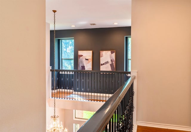 5343 Appleblossom Ln, Friendswood, TX 77546 - corridor with a chandelier, recessed lighting, and wood finished floors