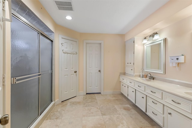 20131 Magnolia Bend Dr, Humble, TX 77346 - bathroom featuring double vanity, a stall shower, recessed lighting, and baseboards