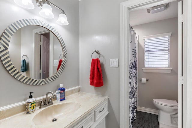 20131 Magnolia Bend Dr, Humble, TX 77346 - full bathroom with vanity, toilet, and tile patterned flooring