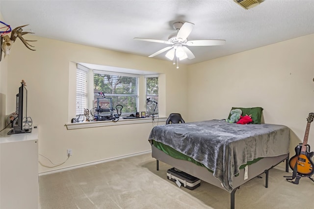 20131 Magnolia Bend Dr, Humble, TX 77346 - bedroom featuring carpet flooring, a ceiling fan, and baseboards