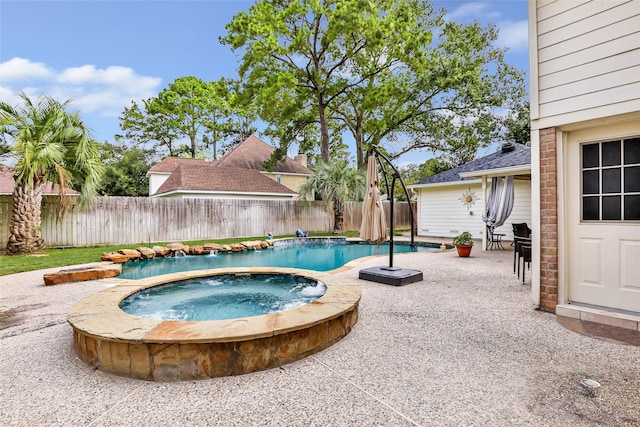 20131 Magnolia Bend Dr, Humble, TX 77346 - view of swimming pool with an in-ground hot tub, a fenced backyard, and a patio area