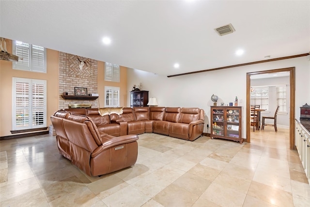20131 Magnolia Bend Dr, Humble, TX 77346 - living room with recessed lighting, baseboards, a brick fireplace, light tile patterned floors, and crown molding