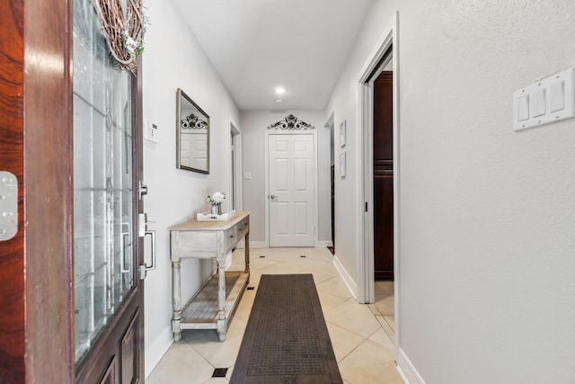 9123 Kapri Ln, Houston, TX 77025 - entrance foyer featuring recessed lighting, light tile patterned flooring, and baseboards