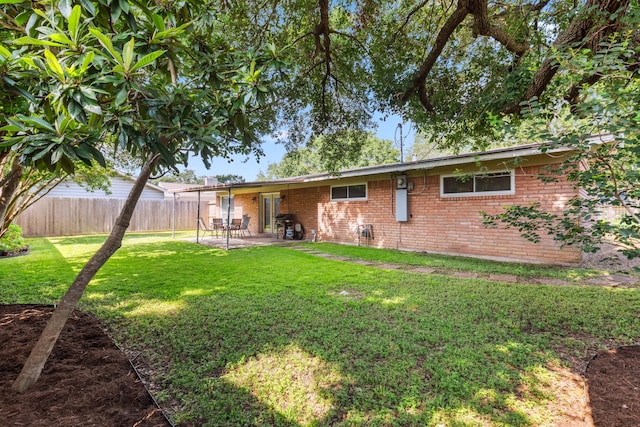 9123 Kapri Ln, Houston, TX 77025 - back of house featuring brick siding and a patio