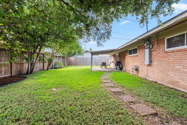 9123 Kapri Ln, Houston, TX 77025 - view of yard featuring a patio