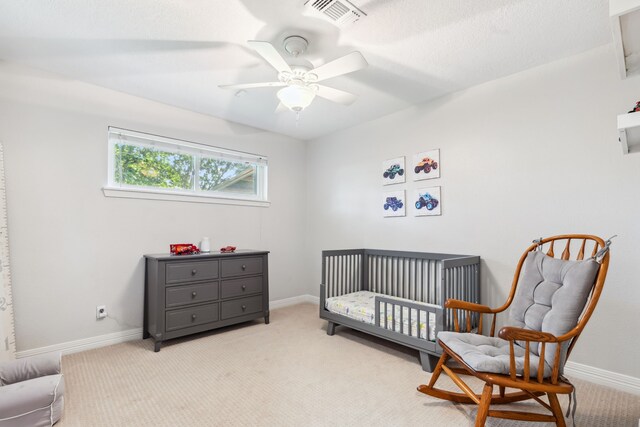 9123 Kapri Ln, Houston, TX 77025 - bedroom with carpet flooring, baseboards, and a ceiling fan