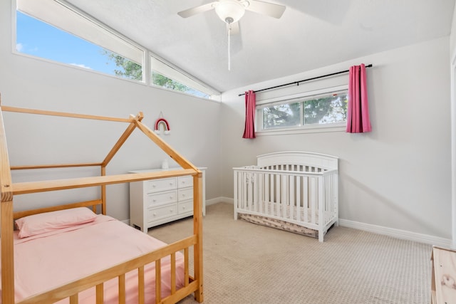 9123 Kapri Ln, Houston, TX 77025 - bedroom featuring carpet flooring, lofted ceiling, baseboards, and a ceiling fan