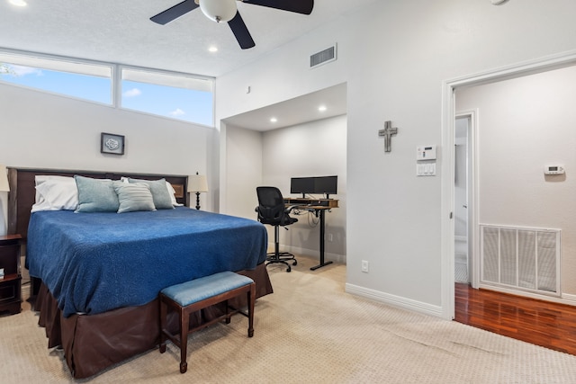 9123 Kapri Ln, Houston, TX 77025 - bedroom featuring baseboards, light carpet, a ceiling fan, a desk, and recessed lighting