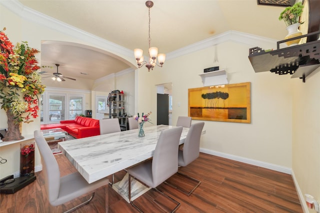 20107 Black Canyon Dr, Katy, TX 77450 - dining room with dark wood finished floors, ceiling fan, a chandelier, lofted ceiling, and baseboards