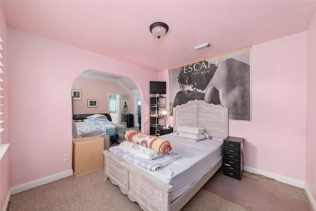 20107 Black Canyon Dr, Katy, TX 77450 - bedroom with arched walkways, carpet flooring, and baseboards