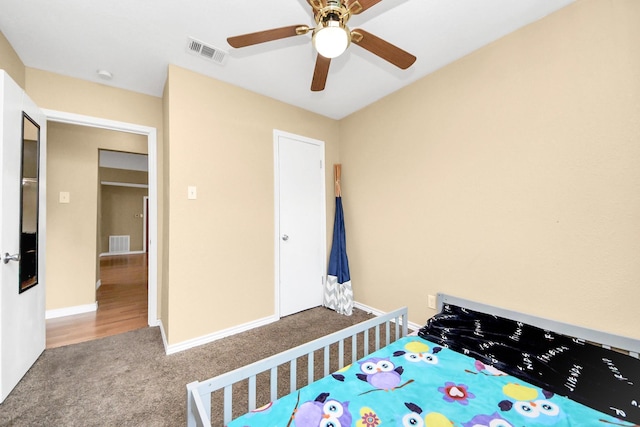 5423 Lillian St, Baytown, TX 77521 - carpeted bedroom with a ceiling fan and baseboards