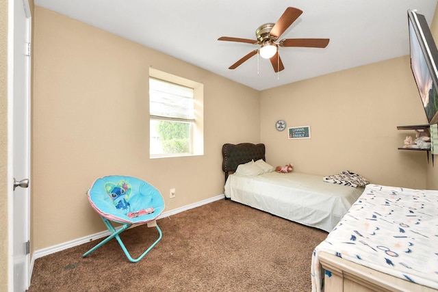 5423 Lillian St, Baytown, TX 77521 - bedroom featuring carpet floors, baseboards, and ceiling fan