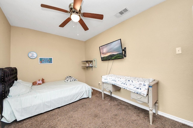 5423 Lillian St, Baytown, TX 77521 - carpeted bedroom with baseboards and ceiling fan