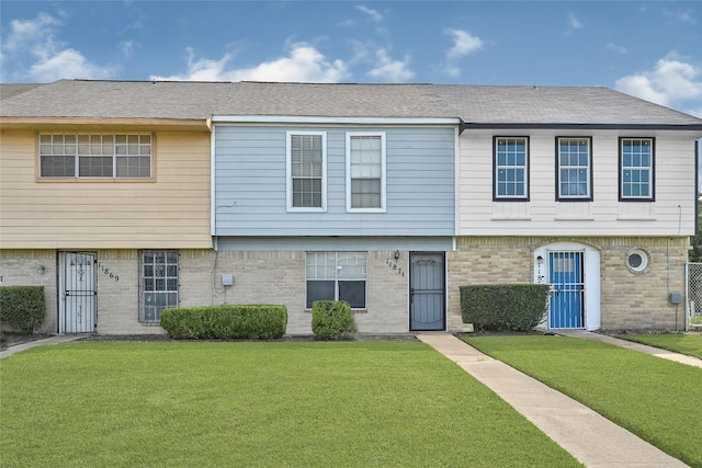 11871 Algonquin Dr, Houston, TX 77089 - view of property with a front yard and brick siding