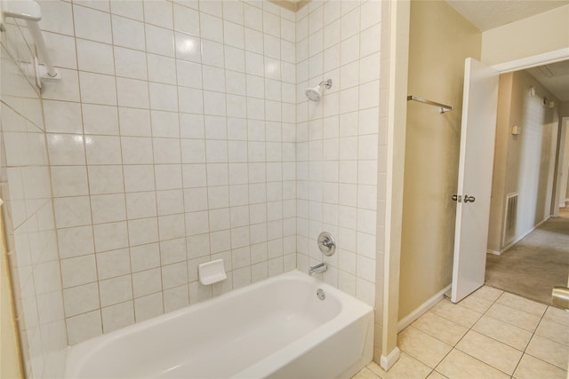 9831 Shell Rock Rd, La Porte, TX 77571 - full bathroom with baseboards, tile patterned floors, and shower / washtub combination
