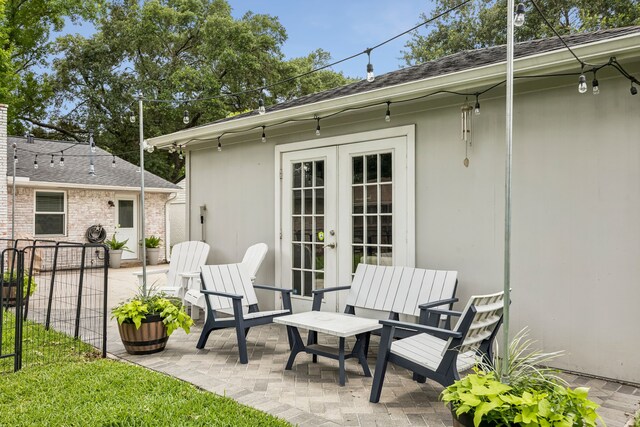 10622 Wickersham Ln, Houston, TX 77042 - view of patio featuring french doors