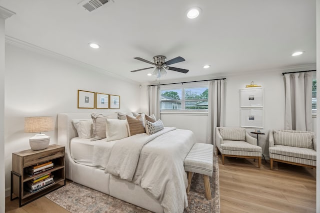 10622 Wickersham Ln, Houston, TX 77042 - bedroom featuring crown molding, light wood finished floors, recessed lighting, and a ceiling fan