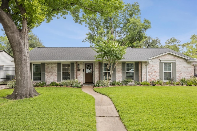 10622 Wickersham Ln, Houston, TX 77042 - single story home with brick siding and a shingled roof