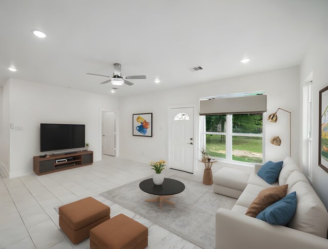 702 Azalea St, Prairie View, TX 77484 - living room featuring a ceiling fan and recessed lighting