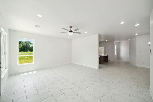 702 Azalea St, Prairie View, TX 77484 - unfurnished living room featuring recessed lighting, ceiling fan, baseboards, and light tile patterned flooring