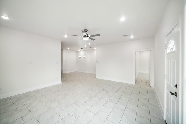 702 Azalea St, Prairie View, TX 77484 - spare room with a ceiling fan, recessed lighting, and baseboards