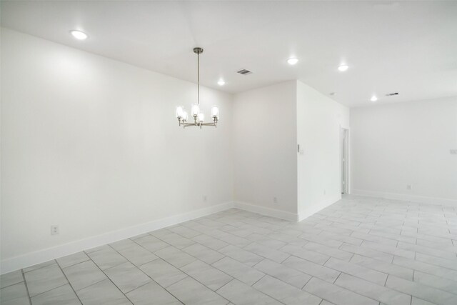 702 Azalea St, Prairie View, TX 77484 - unfurnished room with recessed lighting, a chandelier, and baseboards