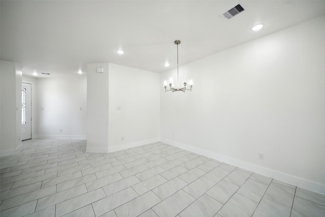 702 Azalea St, Prairie View, TX 77484 - empty room featuring recessed lighting, a chandelier, and baseboards