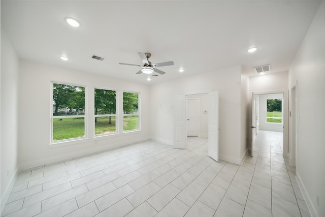 702 Azalea St, Prairie View, TX 77484 - unfurnished room featuring ceiling fan, recessed lighting, baseboards, and light tile patterned floors