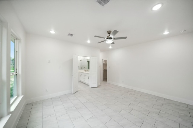 702 Azalea St, Prairie View, TX 77484 - unfurnished bedroom featuring recessed lighting, baseboards, ceiling fan, and ensuite bath
