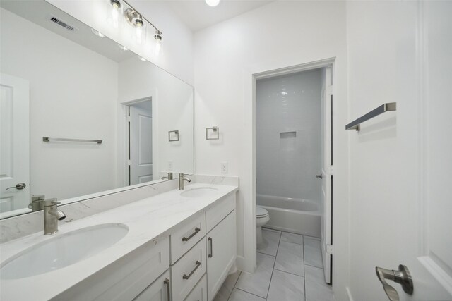 702 Azalea St, Prairie View, TX 77484 - full bath featuring toilet and double vanity