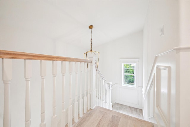 432 Marshall St, Houston, TX 77006 - stairway featuring wood finished floors, wainscoting, and a decorative wall